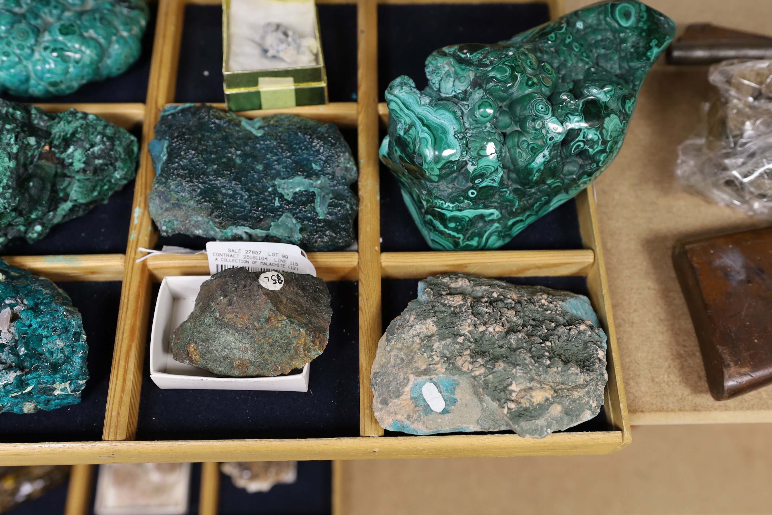 A collection of malachite varying in size and clarity (12)